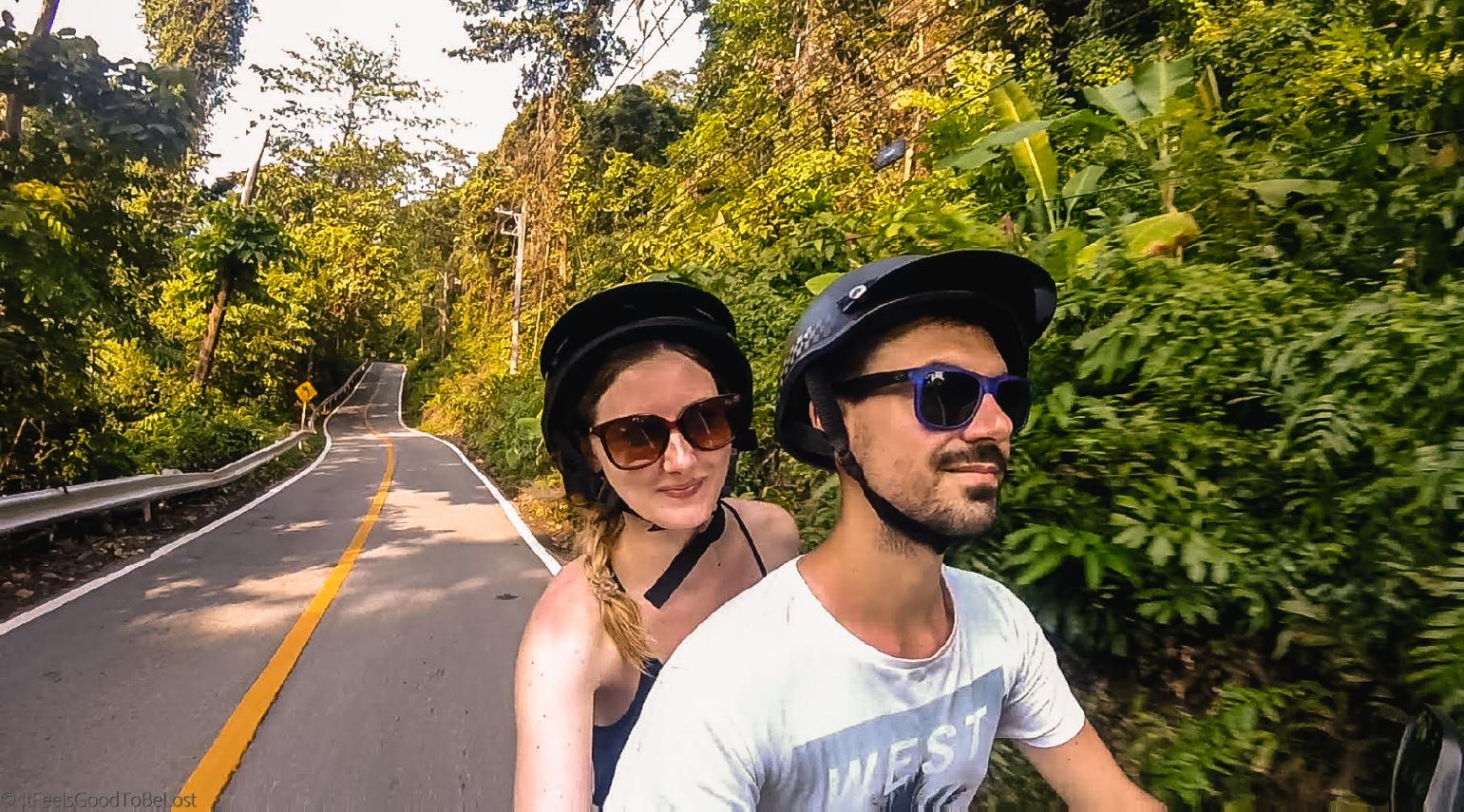 Iga and Rafa riding a motorbike in Koh Chang